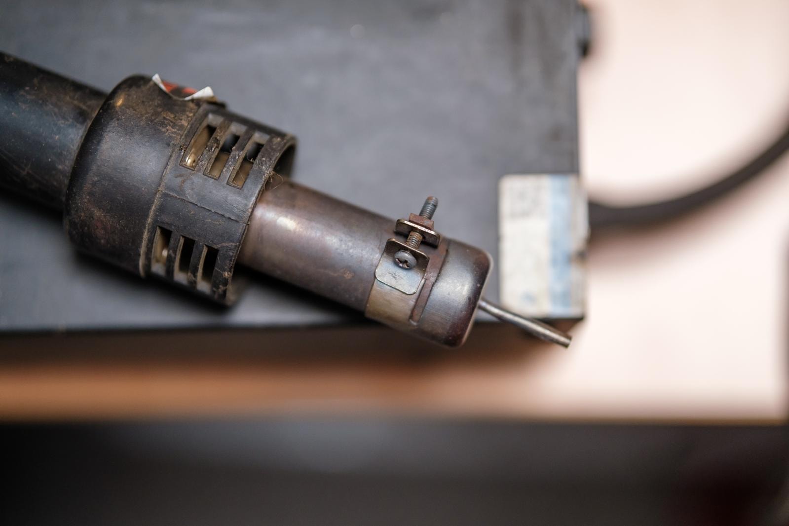 A shot of a soldering iron, used to solder broken saxophone bits back on